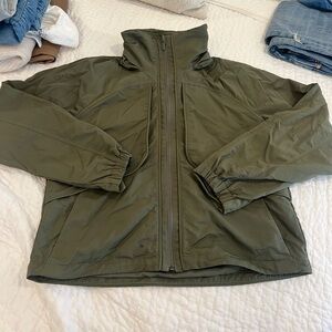 Lululemon cropped green jacket with optional hood. Like new. Size 6.